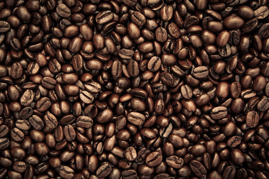 Roasted Coffee Beans background texture. © saranyoo