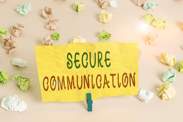 Handwriting text writing Secure Communication. Conceptual photo preventing unauthorized interceptors from accessing Colored crumpled papers empty reminder pink floor background clothespin