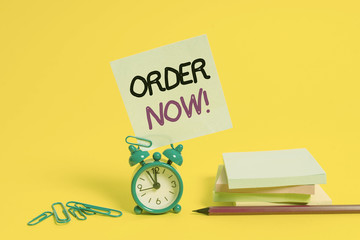 Conceptual hand writing showing Order Now. Concept meaning confirmed request by one party to...