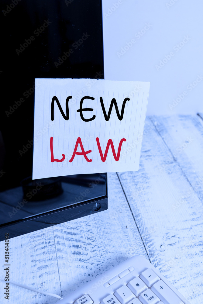 Poster text sign showing new law. business photo text system of rules that enforced through social or gover
