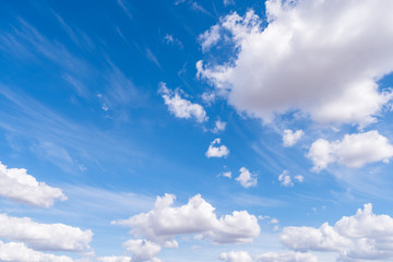 The blue sky with moving white clouds. The most of clouds are beautiful color and shade, suitable for use as background image.