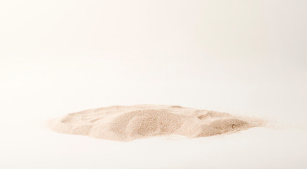 Obraz na płótnie Canvas A lot of dry beach sand on white background