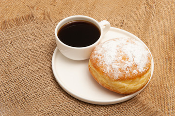 Cup of coffee with donut
