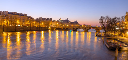View of Pont Royal at sunset in Paris, France.