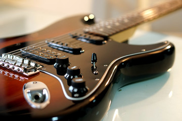 Electric guitar, close up on  background