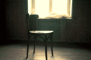 old chair on old and dark room