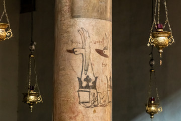 Medieval drawings on a pillar in the main hall of the Church of Nativity in Bethlehem in Palestine