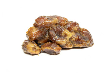 Jaggery coated dates called kahjur in india on white background