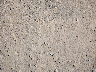 Old peeling paint on the wall. Brown abstract background. Beautiful brown textured stucco on the wall. Background from brown stucco. Background from brown stucco.