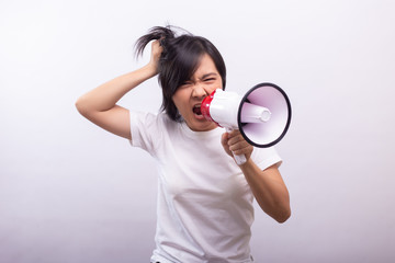 Angry woman with megaphone screaming