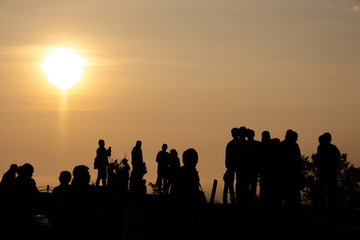 Tourists are watching the light of the sun in the morning