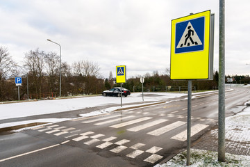 Crosswalk road signs and pedestrian crossing marking