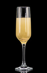 a golden ring in a glass with champagne, many bubbles, like a marriage proposal