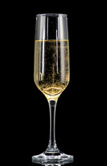 a golden ring in a glass with champagne, many bubbles, like a marriage proposal