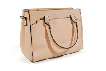 Cream color leather bag on a white background.(with Clipping Path).
