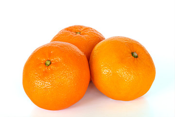 fresh mandarin oranges on white background