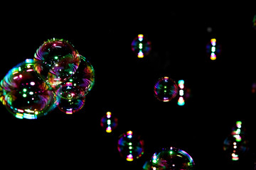 Soap bubbles in black background