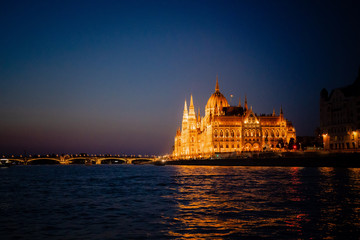Obraz premium Budapest Hungary Parliament Building at Night from Danube River