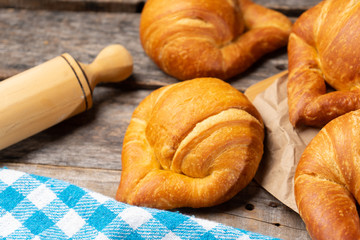 Butter croissant bread on wooden background