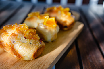 Orange bread on a wooden table