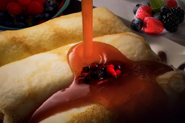 Pancakes with sweet top and berries 