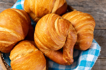 Butter croissant bread on wooden background