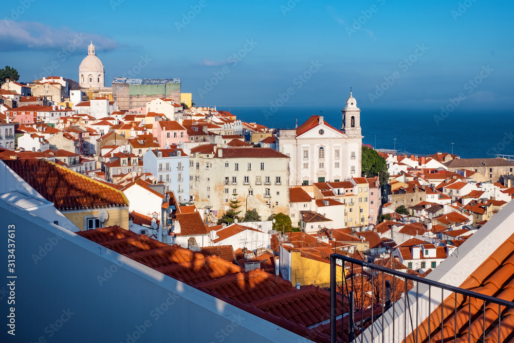 Wall mural aerial view of colorful houses in old part of lisbon, portugal