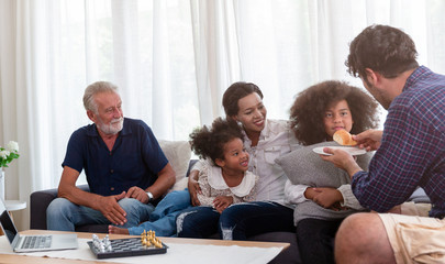 Happy Family with children spend time together in the living room at home.