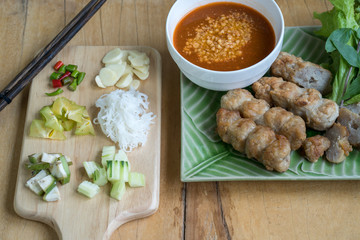 Vietnamese Meatball Wraps on wooden table.