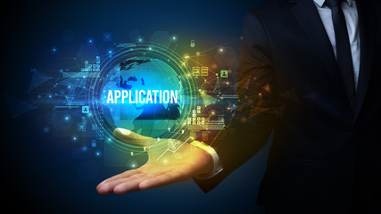 Elegant hand holding APPLICATION inscription, digital technology concept