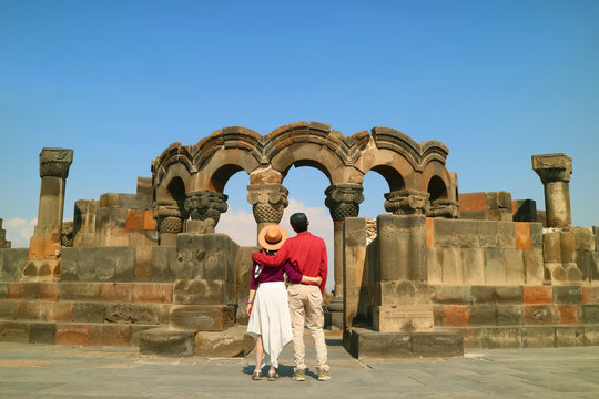 Couple Impressed by the Ancient Zvartnots Cathedral, the Famous Ruins in Armavir Province of Armenia
