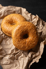 Sesame bagels on dark background
