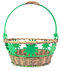 Handmade wicker and metal Easter basket with leaf embellishments. isolated.