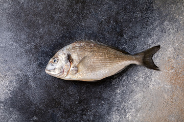 Fresh uncooked Dorado or sea bream fish