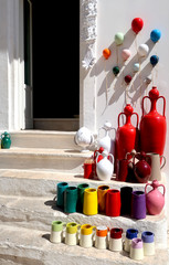 Pottery shop in Locorotondo town, Italy, region of Apulia, Adriatic Sea - colorful pots and...