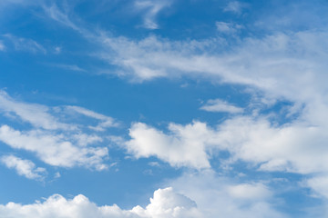 Fototapeta na wymiar Tiny clouds against the blue sky
