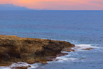 sea cape scene at the evening
