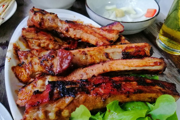 Barbeque Grill Street Food in thailand,Eat outdoors in a happy family.