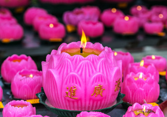 Obraz na płótnie Canvas candle lotus flower is a sacred symbol