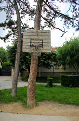 Street public old rusty basketball shield, sport ground at home, active games for children and adults