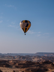 Winter at Tantora Hot Air Balloon Festival over Mada'in Saleh (Hegra) ancient site, Al Ula, Saudi Arabia