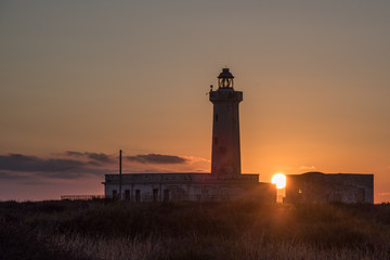 La magia del faro all'alba © samuele