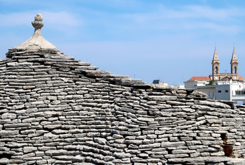 Fototapeta na wymiar Closeup of the roof of the traditional Trulli house in Alberobello city, Italy, Apulia region, Adriatic Sea