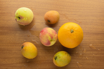 Wet orange, peaches and mangos