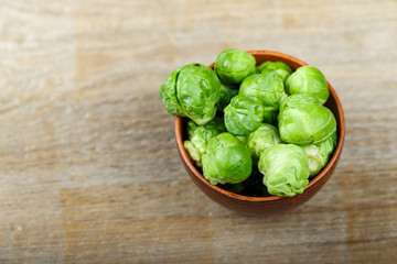 Brussels sprouts on a wooden background