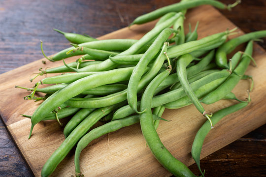 asparagus beans on a cutting board