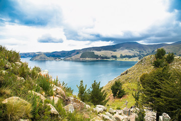 Panoramic view of Copacabana Bay on Titicaca Lake from the summit of Mount Calvario (3966 m) among the most important travel destination in Bolivia.