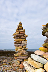towers made of stones on the beach