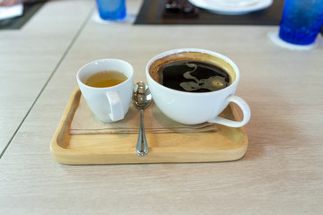 Cup coffee and apple tart on wooden table, coffee break.