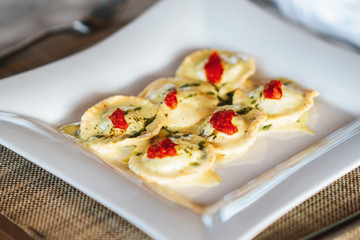 A delicious ravioli is served in a elegance restaurant or hotel